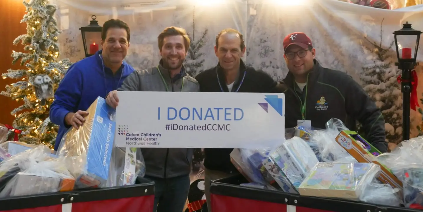 Driftwood staff with donated toys for Cohen’s Children’s Medical Center