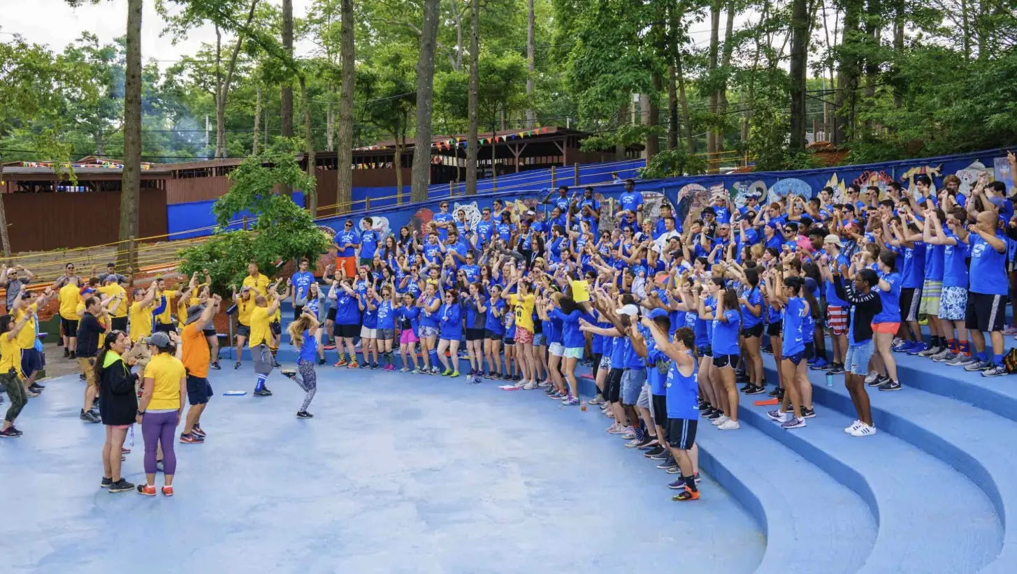 Driftwood campers and staff showing spirit together in the amphitheater